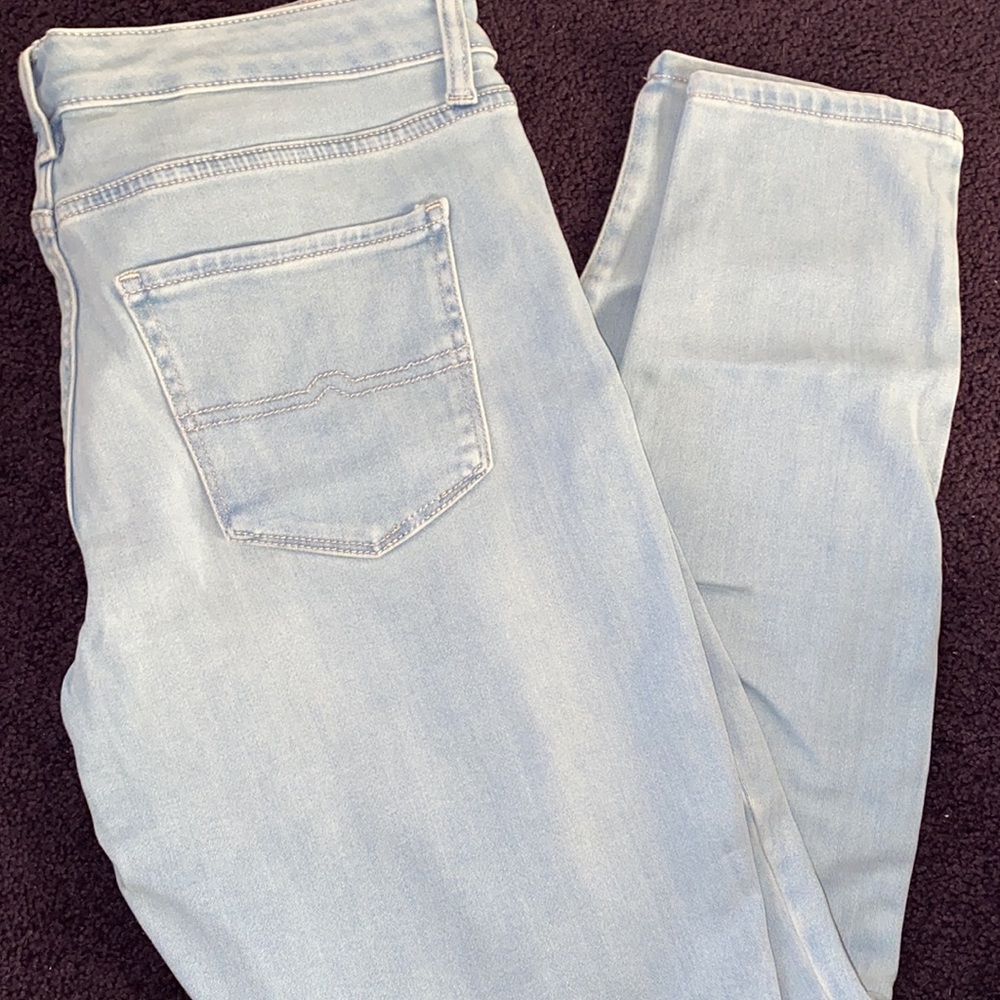 Light blue distressed jeggings